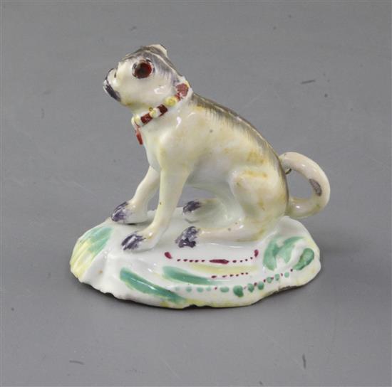 A Derby figure of a seated pug, c.1758-60, h. 6.7cm